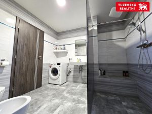 Zděná novostavba přízemního RD 4+kk s pergolou a zahradou v obci Hnojice u Šternberka.