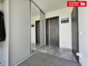 Zděná novostavba přízemního RD 4+kk s pergolou a zahradou v obci Hnojice u Šternberka.