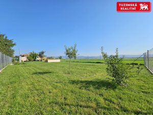 Zděná novostavba přízemního RD 4+kk s pergolou a zahradou v obci Hnojice u Šternberka.